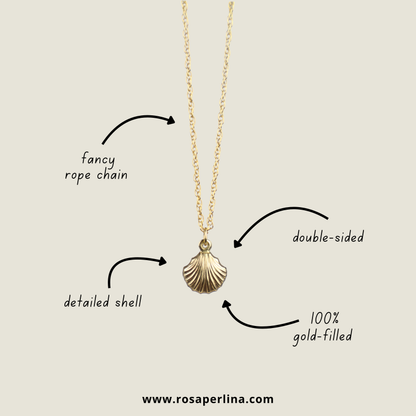 Gold necklace with shell pendant on a beige background, labeled with features and brand name.