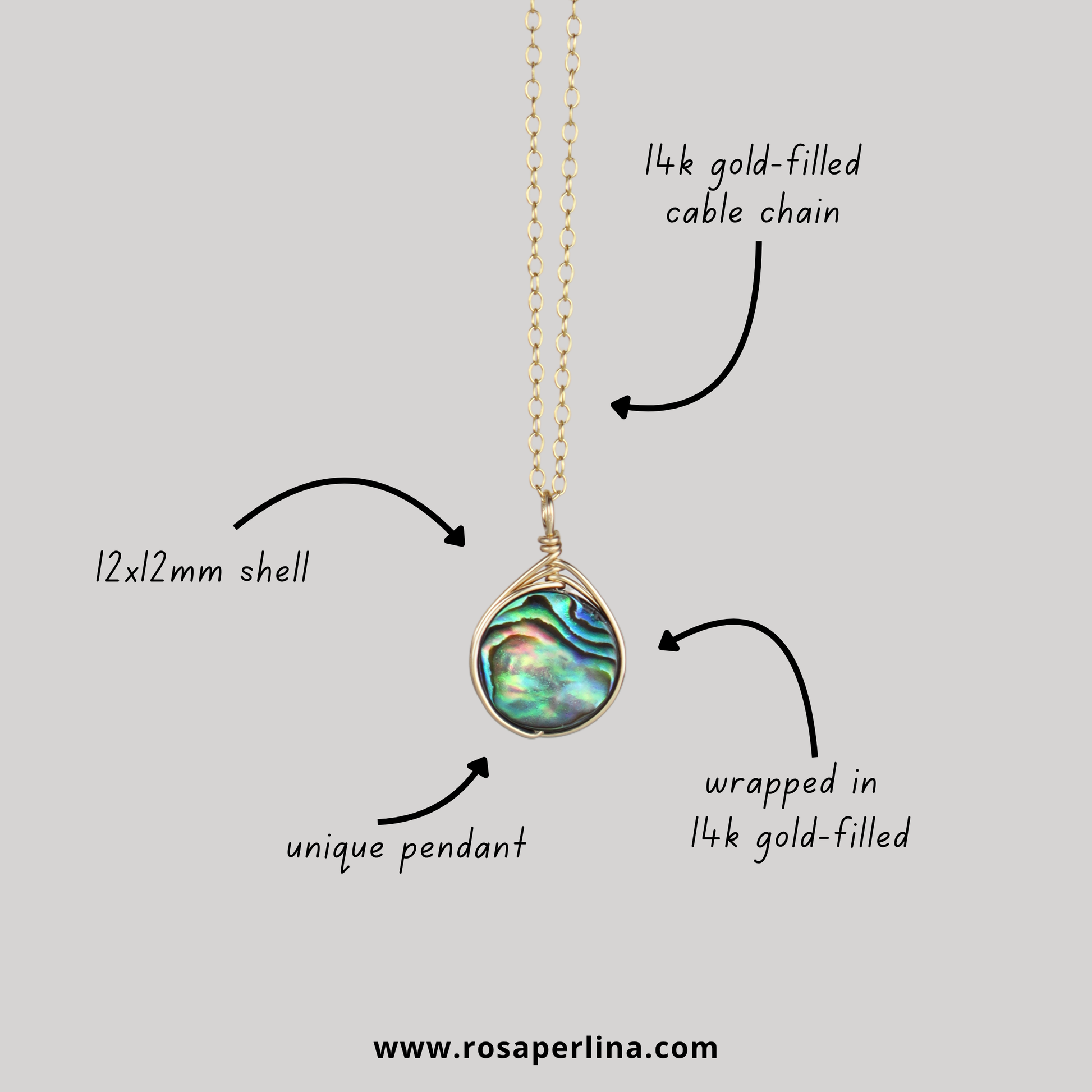 Jewelry necklace with abalone shell pendant and gold-filled chain on a light gray background