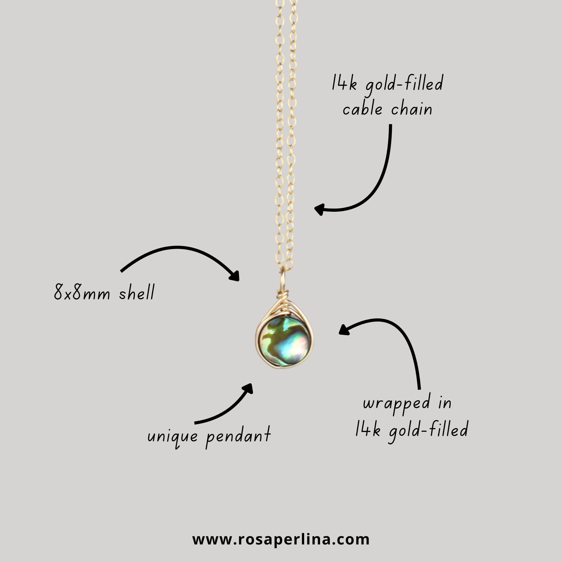 Necklace with shell pendant and gold chain on a light gray background