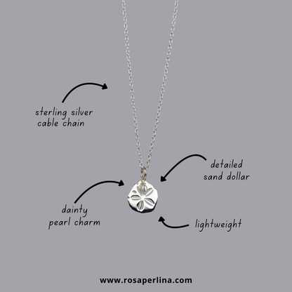 Necklace with sand dollar pendant and pearl charm on a gray background, featuring text labels and a website URL.