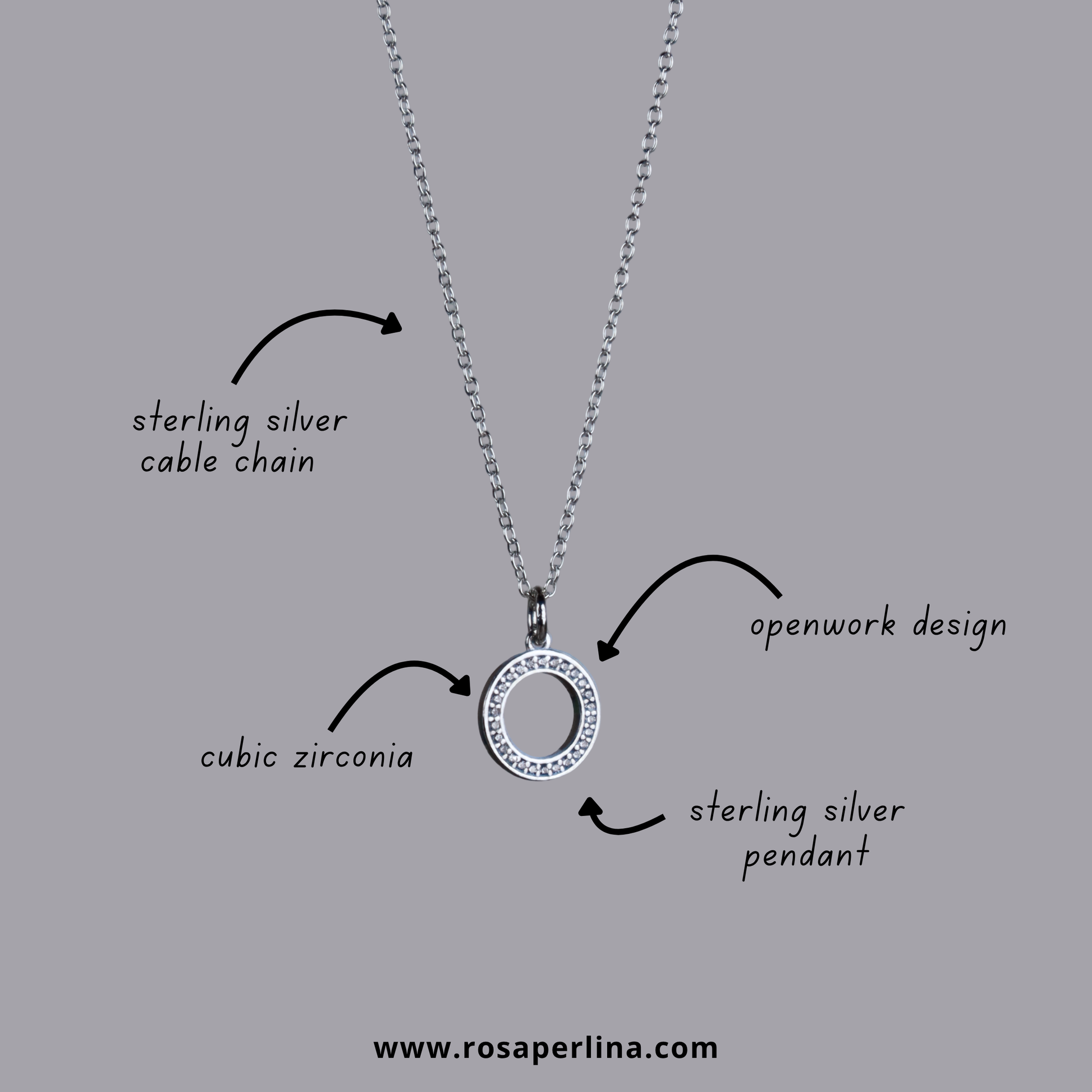 Silver necklace with pendant on a gray background, labeled with features and brand.